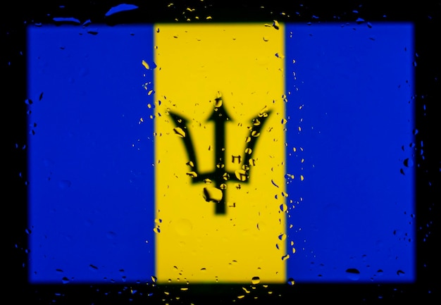 Gotas de agua en el fondo de la bandera de Barbados Profundidad de campo reducida Enfoque selectivo Tonificado