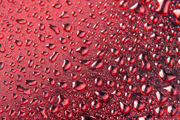 Gotas de agua en un fondo coloreado Textura abstracta