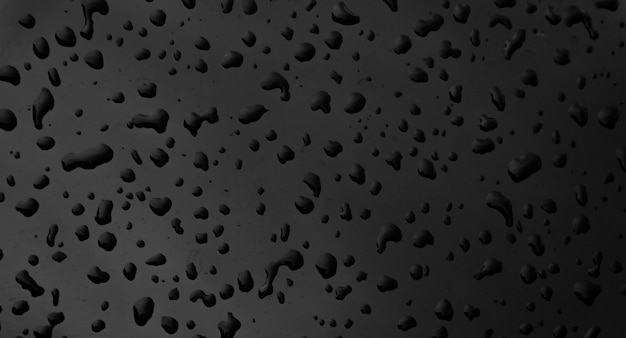 Gotas de agua sobre fondo de textura de superficie oscura negra