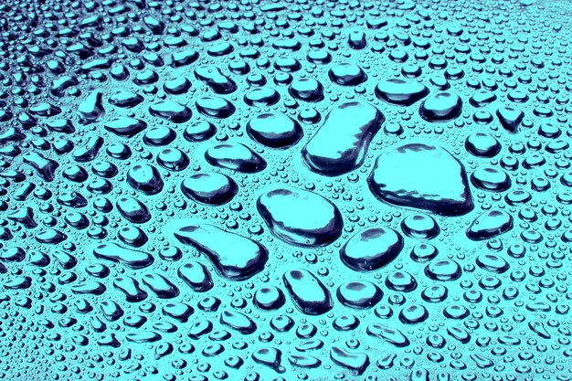 Gotas de agua sobre metal una hermosa textura inusual