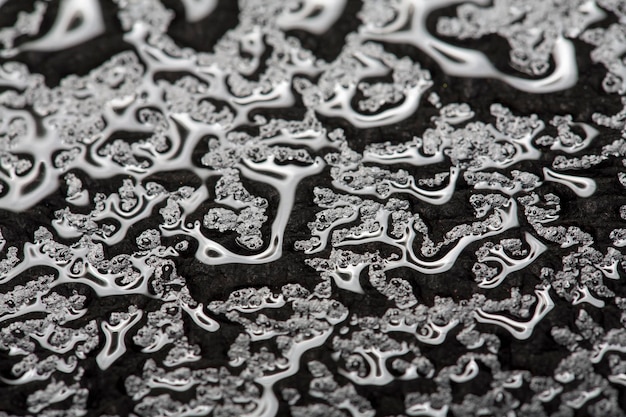 Gotas de agua sobre metal una hermosa textura inusual