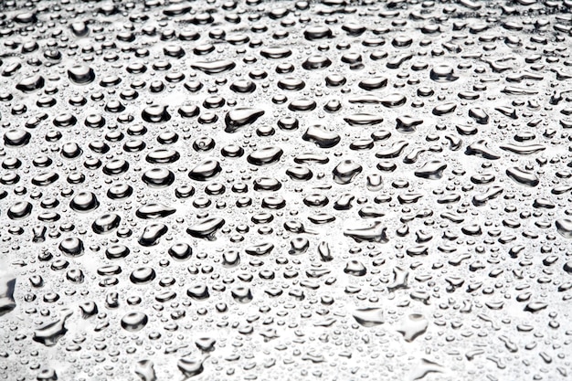 Gotas de agua sobre metal una hermosa textura inusual