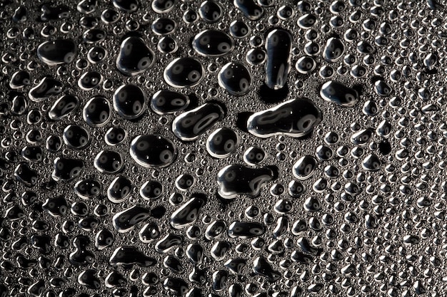 Gotas de agua sobre metal una hermosa textura inusual