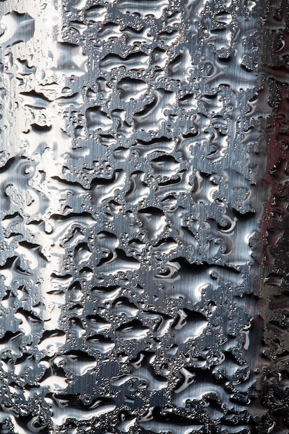 Foto gotas de água em metal uma bela textura incomum