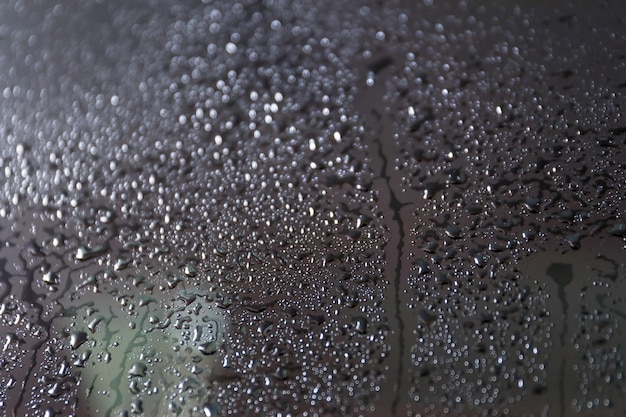 Foto gotas de água na janela do carro fechada