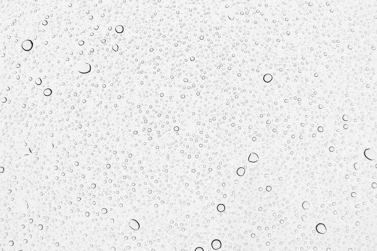 Foto gotas de chuva em fundo de vidro