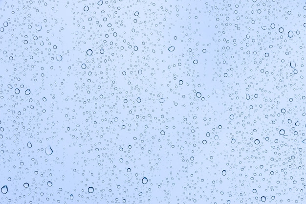 Gotas de chuva no fundo da textura dos vidros das janelas