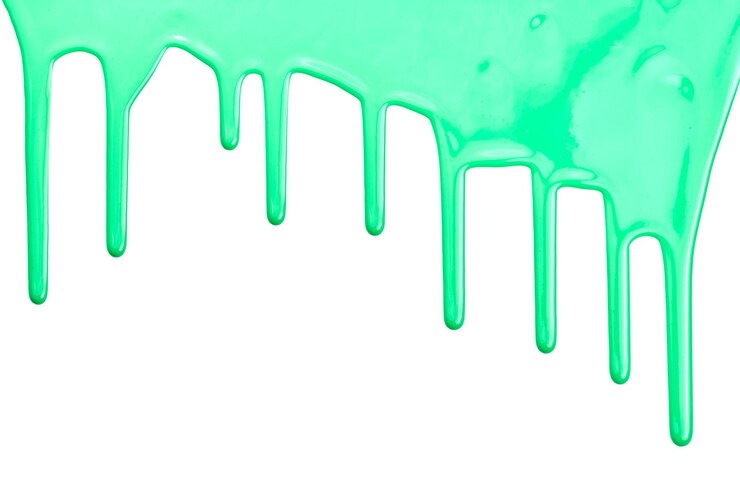 Foto gotas de tinta fluindo em papel branco borrões de tinta verde abstraem o fundo