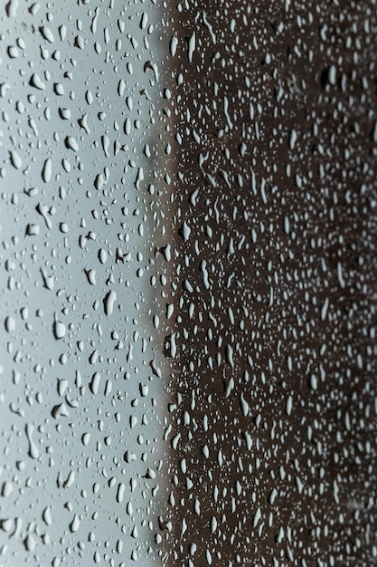 Foto gotas de lluvia en el vidrio o la ventana del automóvil