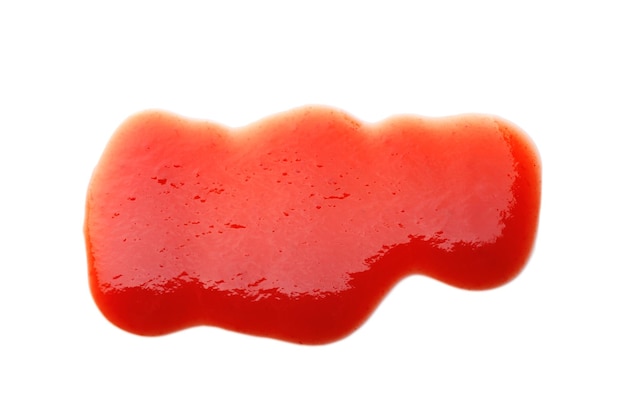 Goteo de ketchup aislado en blanco