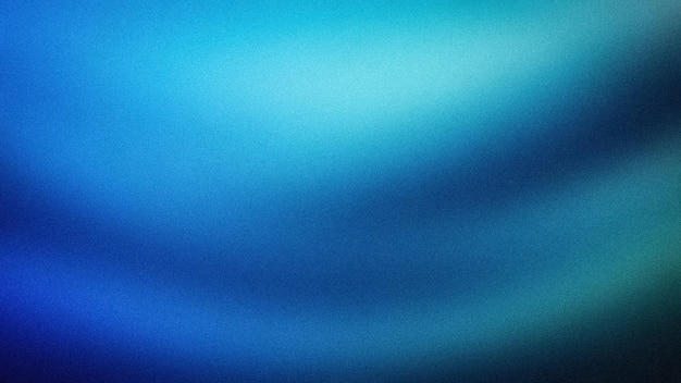 Un gradiente suave de tonos azules y azules con una textura granulada que crea un fondo suave y borroso ideal para diseños digitales, pancartas y proyectos creativos