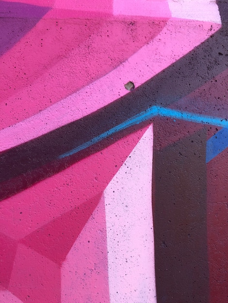 Graffiti-Hintergrund abstrakte Straßenkunst bunte und helle Zeichnungslinien an der Wand