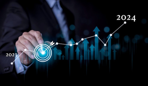 Foto gráfico de datos de crecimiento empresarial flecha con diagrama presupuesto de 2024 grafico de crecimiento futuro corporativo de 2023 a 2024 desarrollo hacia el éxito y la motivación