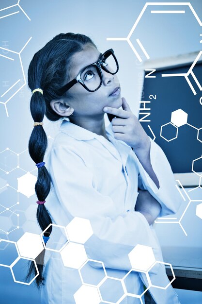 Gráfico de ciência contra aluno bonito vestido como cientista na sala de aula