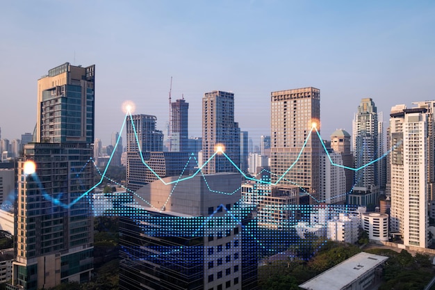 Gráfico de comportamento do mercado holograma vista panorâmica da cidade de bangkok local popular para alcançar o grau financeiro na ásia o conceito de análise de dados financeiros dupla exposição