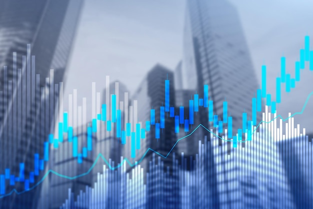 Gráfico de velas de negociação de ações e diagramas no fundo do centro de escritório desfocado