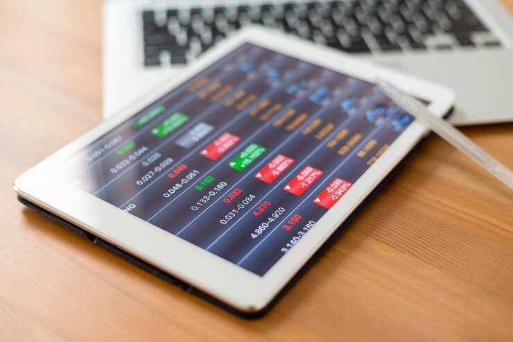 Foto gráfico digital del mercado de valores en una pantalla de tableta