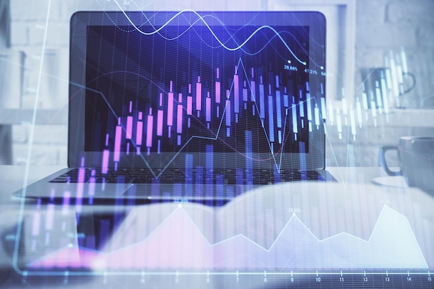 Gráfico do mercado de divisas holograma e computador pessoal em fundo dupla exposição conceito de investimento