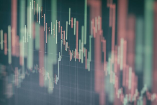 Gráfico econômico com diagramas do mercado de ações, para conceitos e relatórios financeiros e de negócios. Fundo azul abstrato.