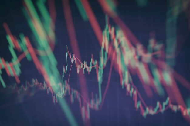 Gráfico económico con diagramas en el mercado de valores, para conceptos e informes comerciales y financieros. Fondo azul abstracto.