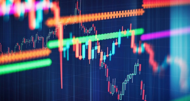 Gráfico financiero abstracto con velas y gráfico de barras del mercado de valores en el fondo financiero