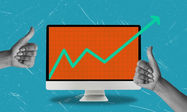 Gráfico de línea de tendencia ascendente verde en la pantalla de la computadora con dos gestos de pulgar hacia arriba