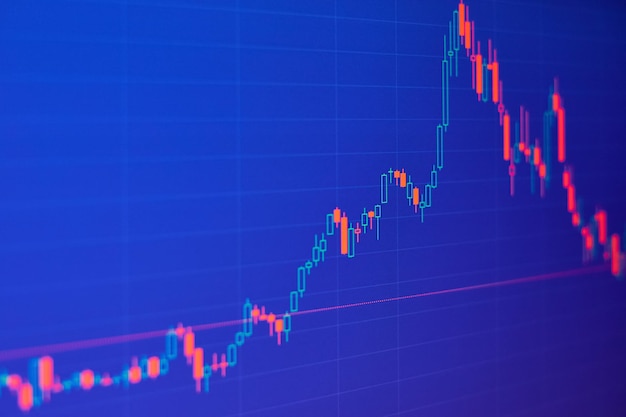 Gráfico del mercado de valores sobre fondo azul.