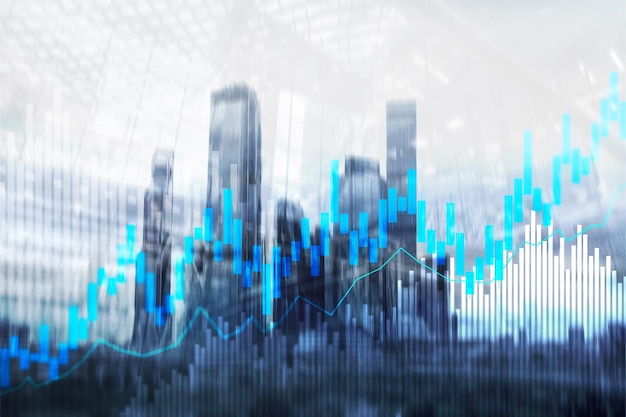 Gráfico de velas de comercio de acciones y diagramas en el fondo borroso del centro de la oficina