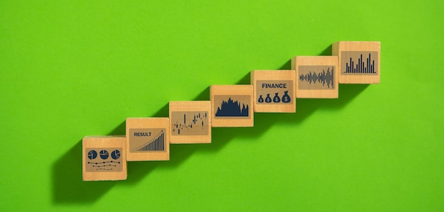 Foto gráficos de crescimento em cubos de madeira negócios
