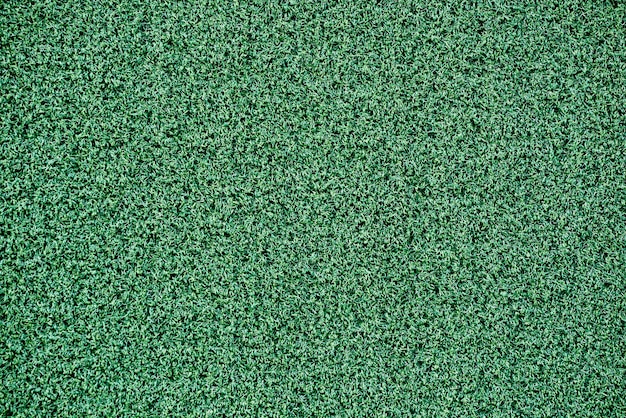 Grama verde artificial de textura para o fundo