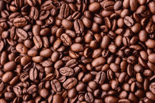 Una gran cantidad de granos de café imagen de fondo de textura de café negro