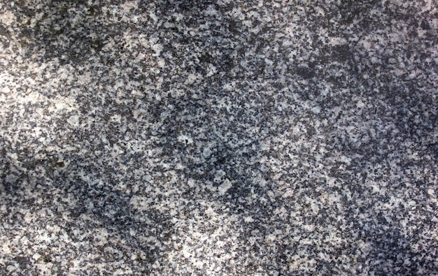 Granito auténtico oscuroPiedra de granitotexturadiseñoFachada de granitosuperficie ásperafondo de detalle