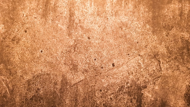 Granitsteinbeschaffenheit. Brown-goldener Steinhintergrund. Alte leere Steinwandoberfläche oder alter schmutziger brauner Papiertexturhintergrund braun oder beige. brauner Goldgrunge.