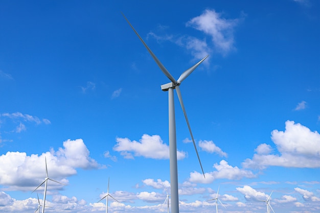 Granja de molinos de viento con el fondo del cielo y las nubes