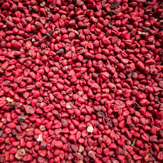 Granos de achiote, fondo de Urucum, textura.