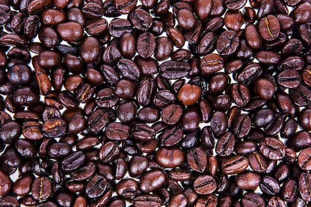 Foto granos de café tostados, se pueden utilizar como fondo