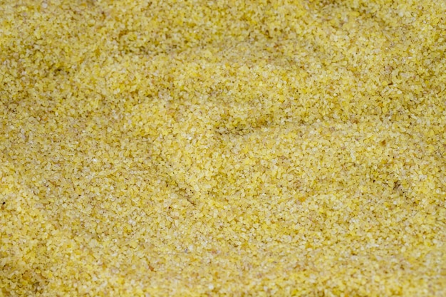 Granos finos de bulgur de primer plano Bulgur como textura de fondo