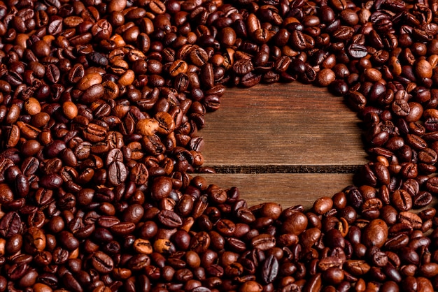 Grãos de café torrado fresco close-up textura de grãos de café
