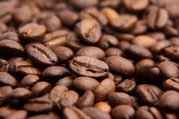 Grãos de café torrados como fundo de comida closeup