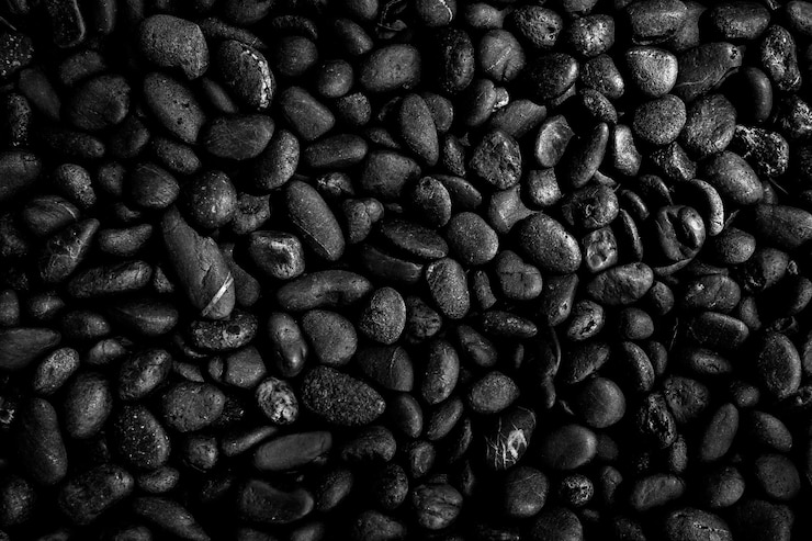 Foto grãos de café torrados de café preto podem ser usados como pano de fundo