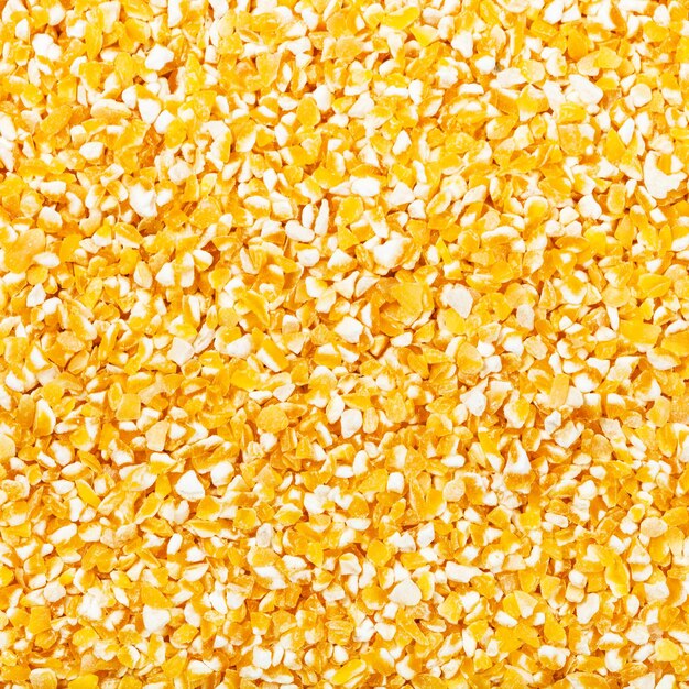 Foto grãos de milho moídos crus fecham