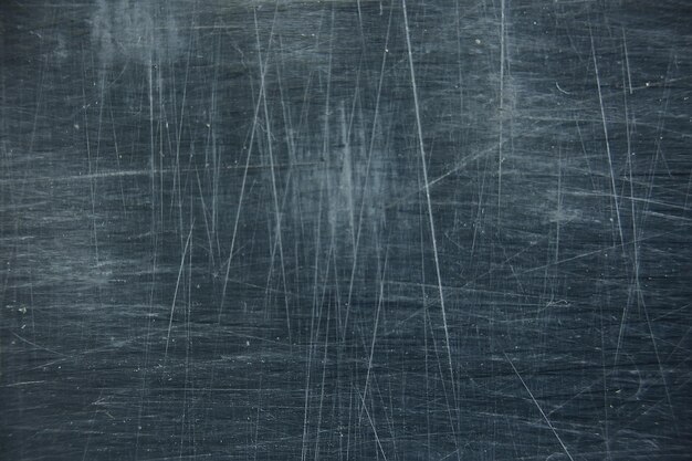 Foto graue hintergrundkratzertextur / abstrakte leere, vintage-wandstruktur mit kratzertapete