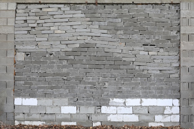 graue Wand aus Ziegelsteinen