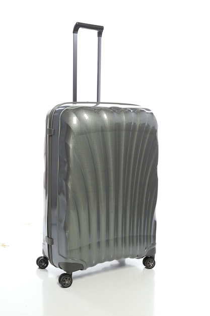 Grauer Koffer auf weißem Hintergrund