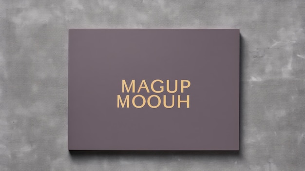 Grauer Samtzeichen-Mockup mit goldenen Buchstaben, launische Monotonen