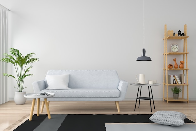 Graues Sofa und Kissen im weißen Wohnzimmer