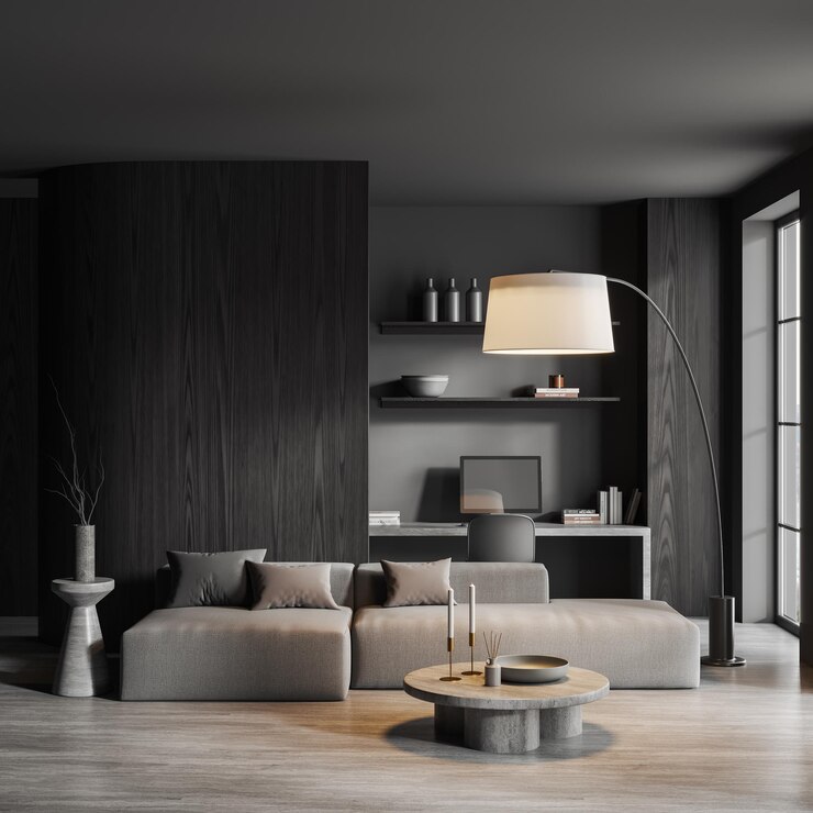 Graues Wohnzimmer mit Couch und Arbeitsplatz mit Dekoration und Fenster