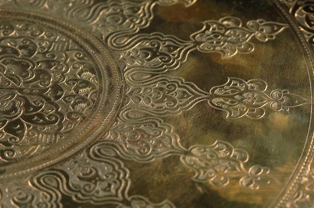 Gravura oriental em bronze, close-up