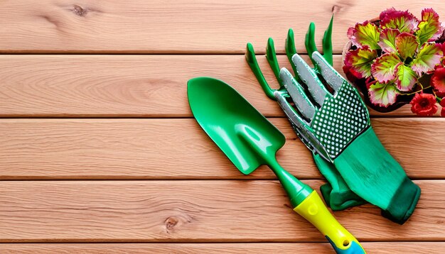 Foto green thumb essentials draufsicht auf gartengeräte auf dem holzboden. machen sie sich bereit für die kultivierung