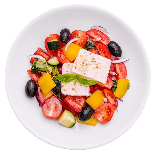 Griechischer Salat aus Bio-Gemüse mit Tomaten, Gurken, roten Zwiebeln, Oliven